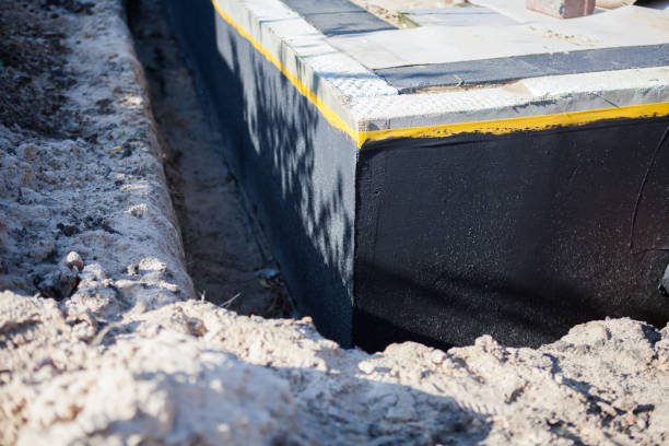 Professional Waterproofing technician working in Elizabethtown, IN